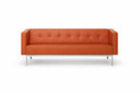 A modern orange leather sofa with a tufted backrest and slim silver metal legs, shown against a plain white background.