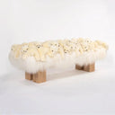 AP Collection Polar Wood Bench Long low bench upholstered in white faux fur topped with many small white plush polar