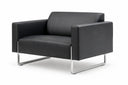 A modern black leather armchair with a chrome metal U-shaped base, shown from a three-quarter angle on a white background.