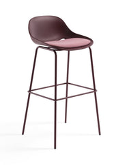 Bar stool with pink seat and backrest on a white background