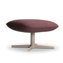 A modern oval-shaped pouf or ottoman with a textured burgundy fabric cushion on a light gray metal pedestal base, shown against a plain white background.