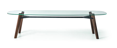 Glass coffee table with wooden legs on a white background