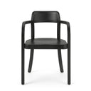 A modern black armchair with a curved wooden frame and padded seat and backrest, photographed against a clean white studio background.