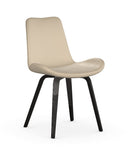 A modern dining chair with a beige upholstered seat and backrest, supported by four slim black metal legs, shown against a plain white background.