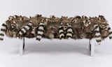 Fur-covered bench with raccoon-like patterns on a white background