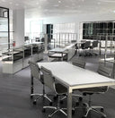 Classic Aluminum Task Chair-Thin Seat from Luxy with gray upholstery and chrome frame in a modern office