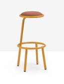 Midj Less M TS Stool in mustard yellow with a round brown fabric seat and a lower ring footrest