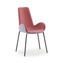 A modern dining chair with a dusty rose velvet upholstered seat and back, a light lavender-gray curved armrest, and slim black metal legs, shown on a white background.
