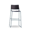 A modern counter stool with a dark gray ribbed fabric seat and backrest, supported by a slim dark blue metal wire frame, shown against a plain white background.