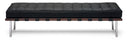 A modern tufted bench with a black leather cushioned top, a dark wood slatted base, and chrome legs, shown against a plain white background.