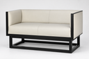 A modern two-seater sofa with cream-colored leather cushions and a black metal frame, shown against a plain light gray background.