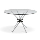 A modern round glass-top table with a chrome-finished metal base, shown on a plain white background.