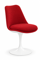 A modern red upholstered swivel chair with a curved backrest and a white tulip-style pedestal base, shown on a clean white background.
