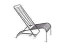 A modern chrome metal lounge chair with a slatted backrest and seat, shown at an angle on a white background.