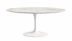 Round marble table with white pedestal base on a white background