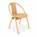 A modern wooden dining chair with a curved backrest, light natural wood seat, and tapered legs, shown on a clean white background with product text and the Ton logo.
