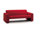 A modern red upholstered loveseat sofa with wide armrests and a low back, shown on a clean white background.