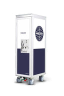 A Pan Am branded mobile beverage cart on wheels, featuring a white and navy blue color scheme with the Pan Am globe logo on the side.