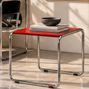 Marcel Breuer Small Laccio red lacquer tabletop and chrome frame in a digitally staged interior