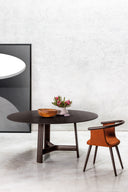 River dining table by Bross in a contemporary dining setting