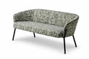 A modern two-seater sofa with curved arms and slim black legs, upholstered in a beige and brown speckled patterned fabric, shown on a white background.