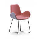 A modern accent chair with a dusty rose pink molded seat and back, a light gray side bolster, and a black metal wire frame, shown on a white background.