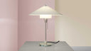 Wilhelm Wagenfeld WG 27 Table Lamp by TECNOLUMEN conical white shade chrome stem glass base lit
