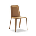 Fasem Ande Dining Chair in tan leather, isolated on neutral white studio background