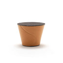 Fasem Electa Side Table in tan hide leather with dark Emperador marble top, neutral white studio background