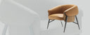Fasem Montgomery W lounge armchair in a softly lit neutral interior, official manufacturer lifestyle photography