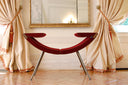 Luxy Clop CP2 with red curved upholstered seat and galvanic metallic structure in classic interior
