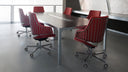Luxy Italia steel frame office chairs around a contemporary conference table