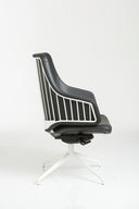 Italia IT10 Steel Chair by Luxy, side profile showing black upholstery and decorative steel back framework