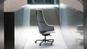 Italia IT2 Steel Executive Chair by Luxy in a contemporary architectural office interior