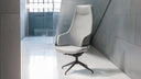 Italia IT5 Steel Executive Chair by Luxy in a contemporary concrete architectural interior