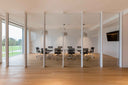 Luxy Nulite office chairs in sunlit conference room