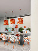 Midj Bolle P M TS IN Indoor chairs white with orange polka dots and orange legs around a dining table