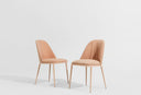 Pair of Midj Lea Deluxe S M TS armless side chairs in blush upholstery with pleated backrest, front and rear views