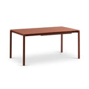 A rectangular wooden dining table with a reddish-brown finish and slim metal legs, shown on a clean white studio background.