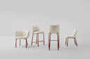 Midj Mys M TS upholstered kitchen stool in cream fabric shown with coordinating Mys side chairs in studio