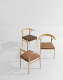 Midj Oslo P L TS light ashwood dining armchairs with fabric upholstered seats, three angles against a pale background