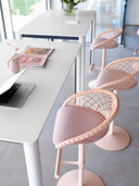 Two Midj P47 SG TS CU Height Adjustable Swivel Stools with light pink weave shells and pink fabric seats