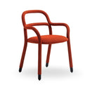 A modern armchair with a woven orange-brown textured fabric upholstery and black protective rubber feet, shown on a clean white background.