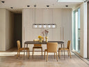 Midj S1 S R TS upholstered side chairs around a dining table in a light contemporary interior