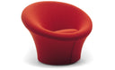 A modern sculptural armchair upholstered in a vibrant red fabric, shown from a three-quarter angle on a clean white background.