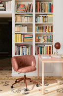 Midj Mys DP TS height-adjustable five-caster office armchair in blush upholstery in a home library