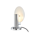 Modern table lamp with glass shade and chrome base on a white background