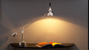 Eduard-Wilfrid Buquet EB 28 table lamp by TECNOLUMEN on a desk