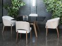 Tonon Libra armchairs arranged around a glass dining table