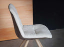Tonon Step soft upholstered wood base dining chair in interior